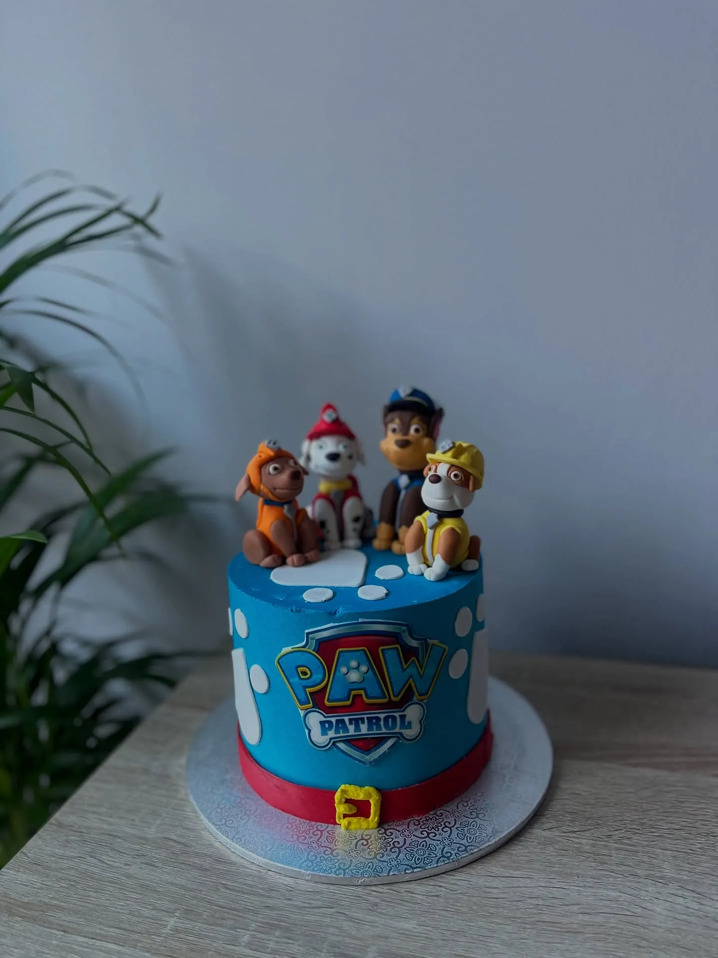 Blue Paw Patrol cake with four handmade figures